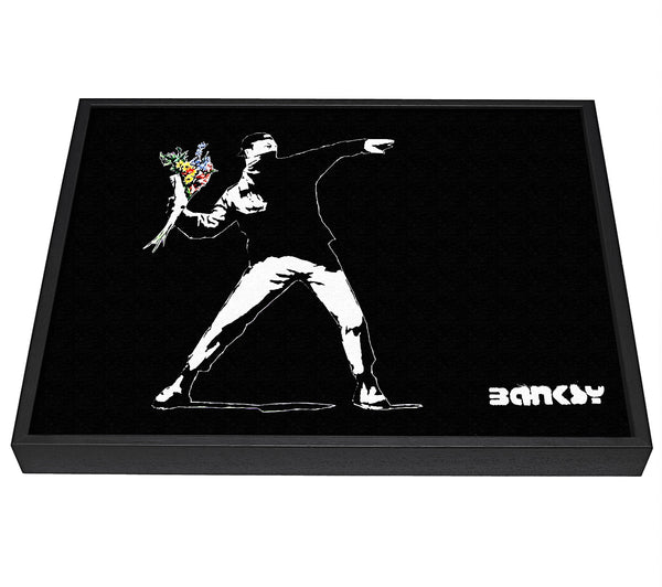 A picture of a Flower Thrower Black framed canvas print sold by Wallart-Direct.co.uk