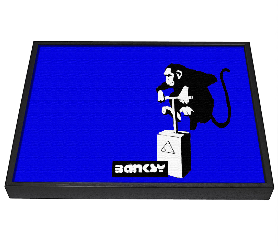 A picture of a Monkey Detonator Blue framed canvas print sold by Wallart-Direct.co.uk