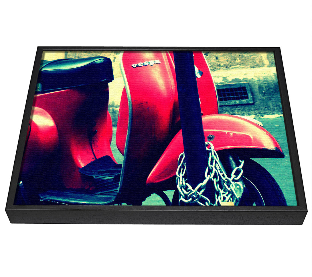 A picture of a Vespa framed canvas print sold by Wallart-Direct.co.uk