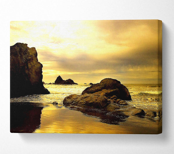 Rocky Beach At Yellow Dawn