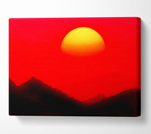 Huge Sun Over The Mountain Tops Red