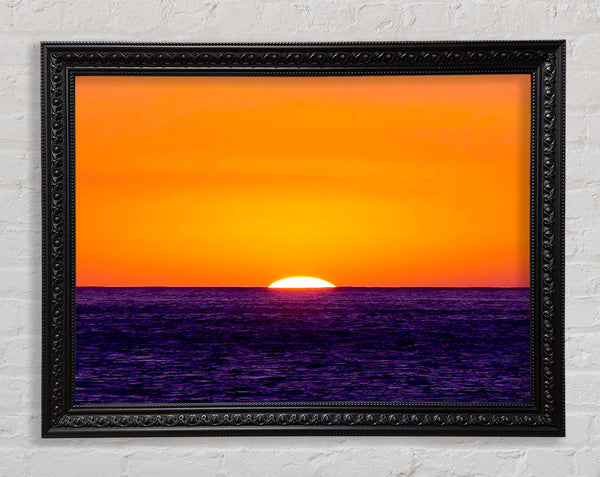 As The Sun Goes Down Over The Ocean Orange