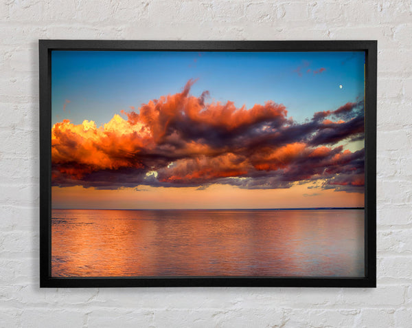 Red glowing clouds above the sea