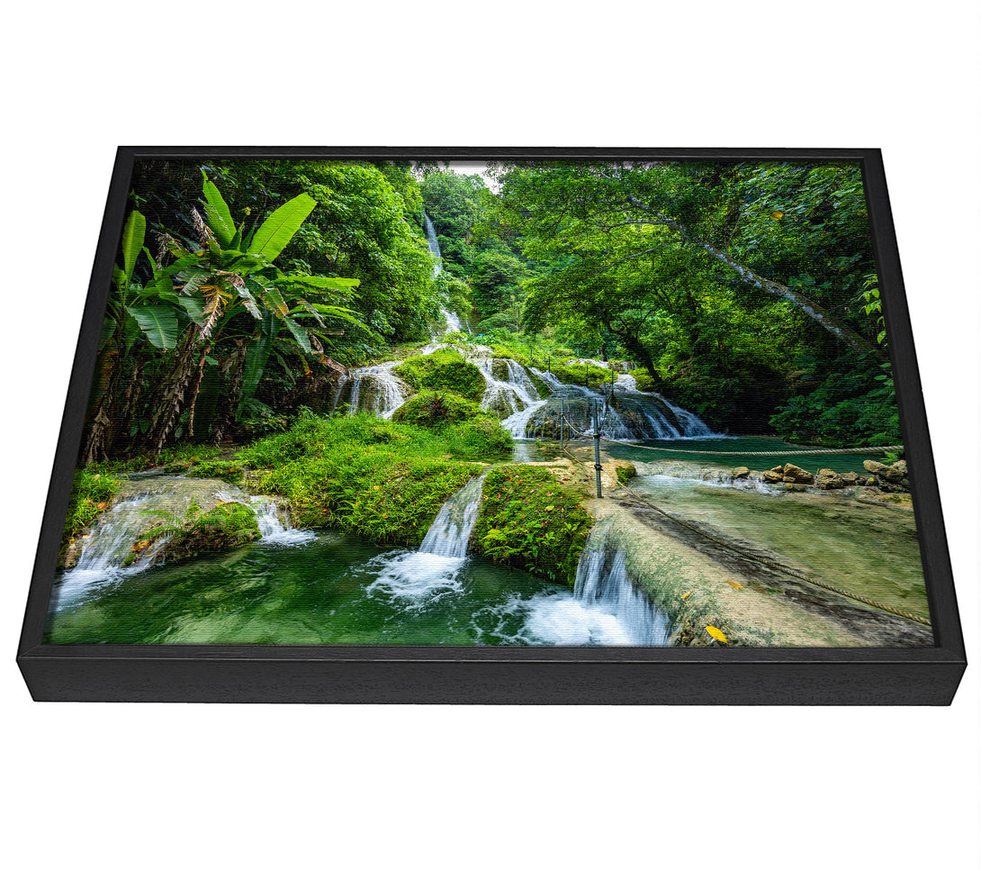 A picture of a Green paradise mountain jungle framed canvas print sold by Wallart-Direct.co.uk