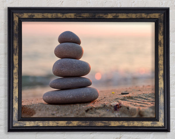 Zen stones stacked up on beach