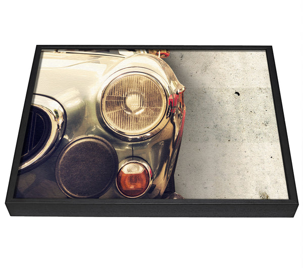 A picture of a Close Up Classic Headlight framed canvas print sold by Wallart-Direct.co.uk