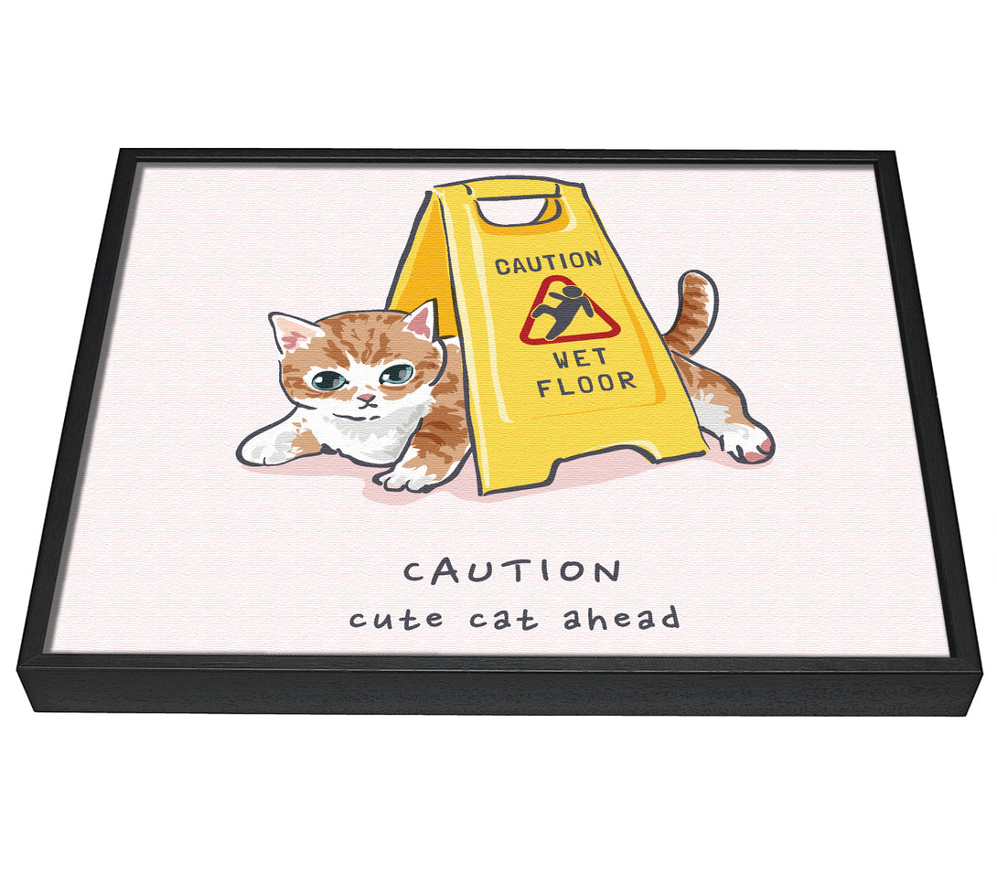 A picture of a Caution Cute Cat framed canvas print sold by Wallart-Direct.co.uk