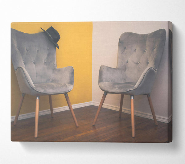 Grey Chairs And Yellow Wall