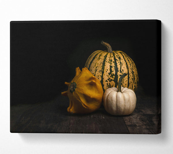 Yellow Gourds On Wood