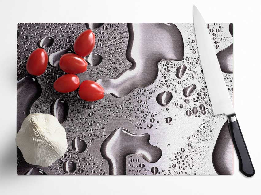 Water Drops On Silver Surface Glass Chopping Board