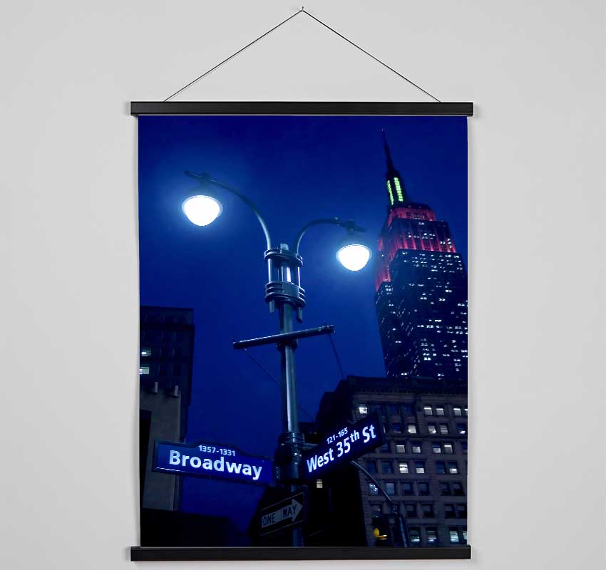 Empire State Building Lights Hanging Poster - Wallart-Direct UK