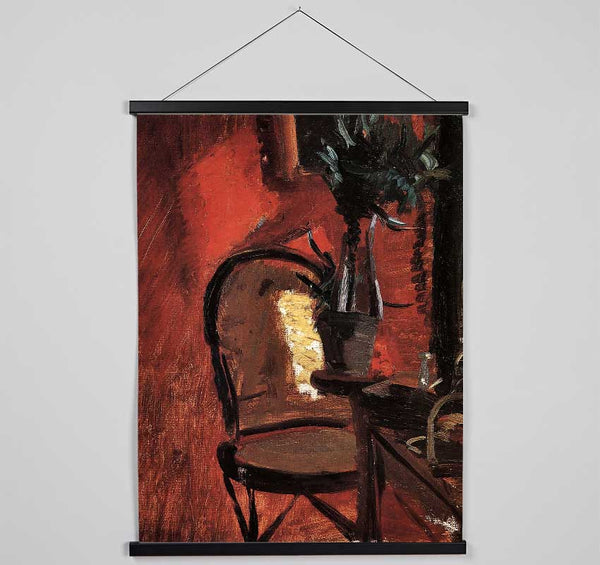 Anna Ancher Chair With A Plant In Front Of Red Wall Hanging Poster - Wallart-Direct UK