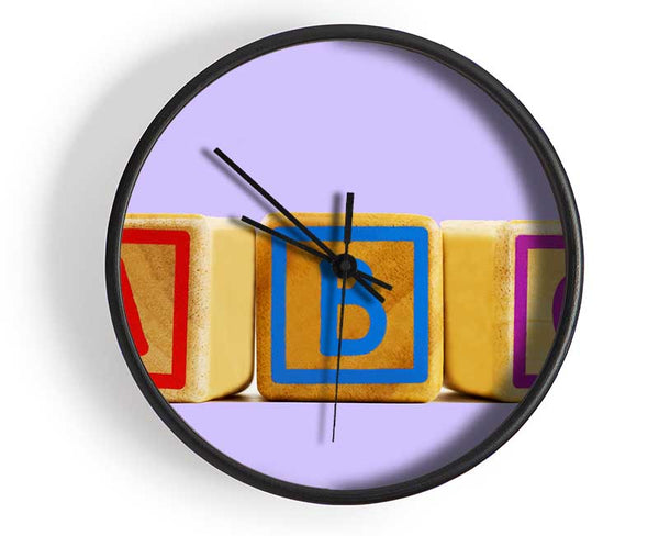 Three Alphabet Blocks Lilac Clock - Wallart-Direct UK