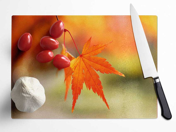 Orange Leaves Sparkle Glass Chopping Board