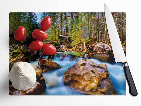 Secluded River Retreat Glass Chopping Board