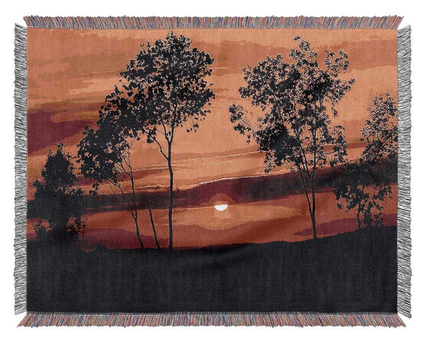 Red Sunrise Through The Trees Woven Blanket