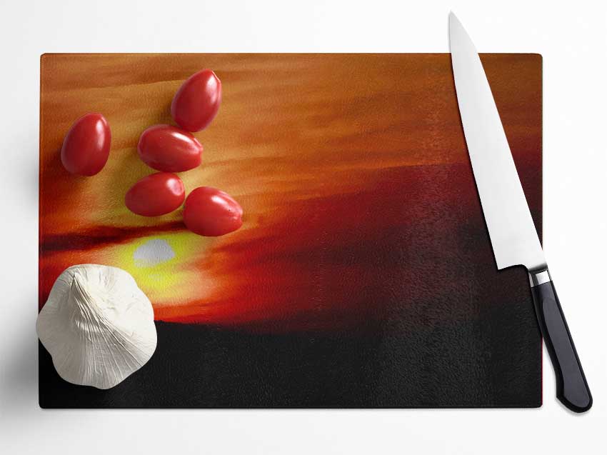 Sun Through The Red Clouds Glass Chopping Board