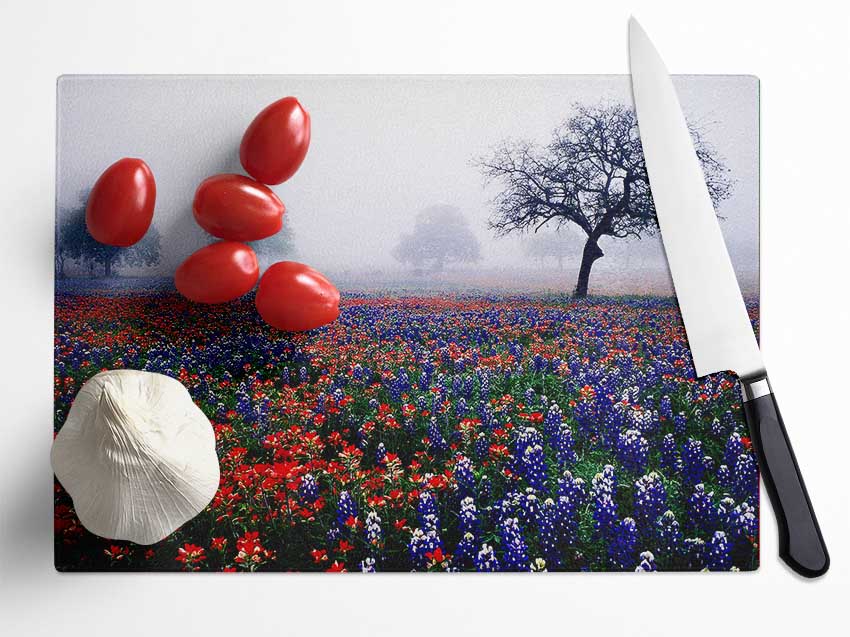 Field Of Flowers In The Morning Mist Glass Chopping Board