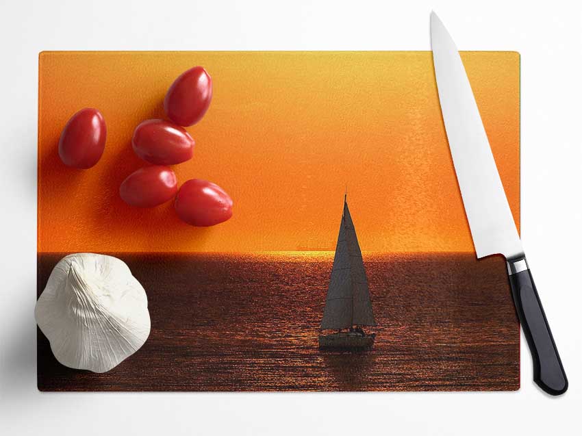 Sailing In The Stunning Sunset Ocean Glass Chopping Board