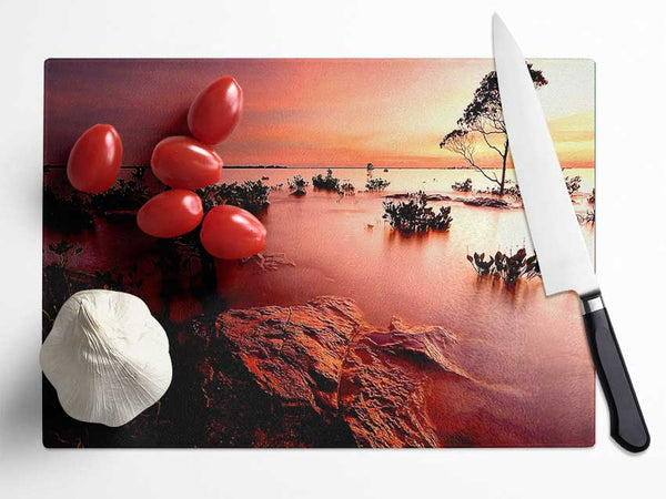 Tranquil Pink Ocean Trees Glass Chopping Board