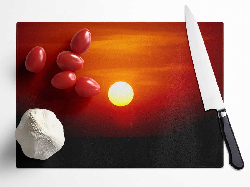 Sun Over The Black Ocean Glass Chopping Board