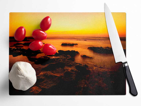 Yellow Sunset Rocks Glass Chopping Board