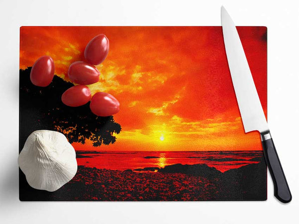 Stunning Orange Skies Over Ocean Glass Chopping Board