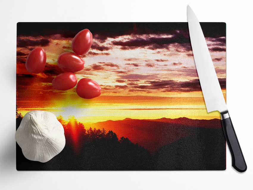 Sunrise Over Treeline Glass Chopping Board