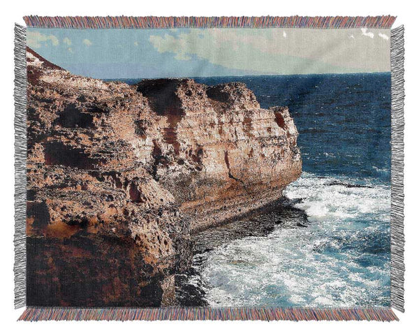 Cliff Face Ocean Woven Blanket