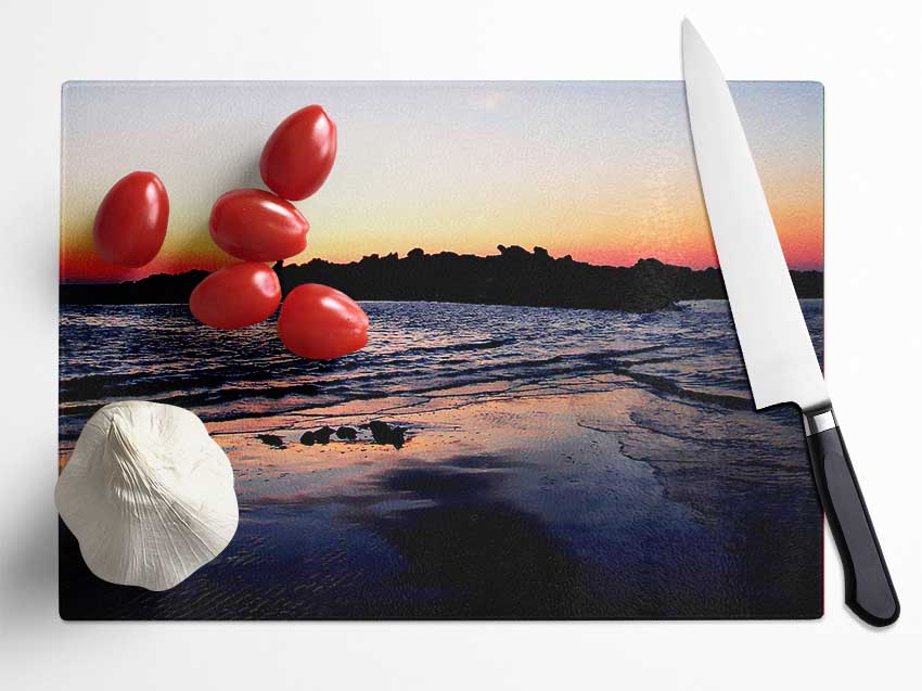 Sunset Behind The Ocean Rocks Glass Chopping Board