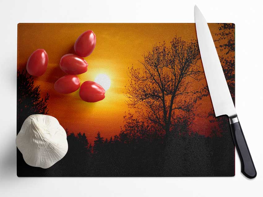 Orange Sunset Over Trees Glass Chopping Board