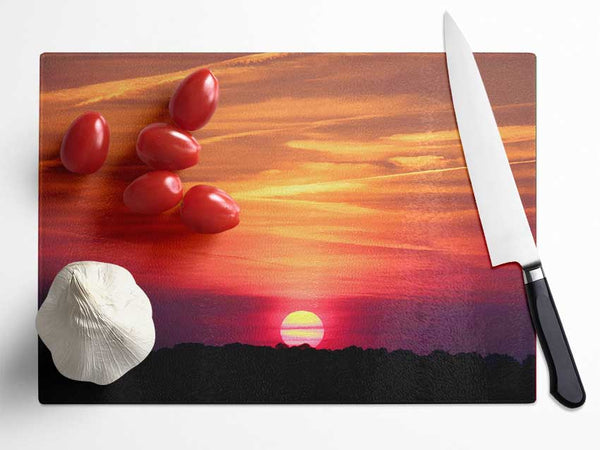 Clouds Across The Setting Sun Glass Chopping Board