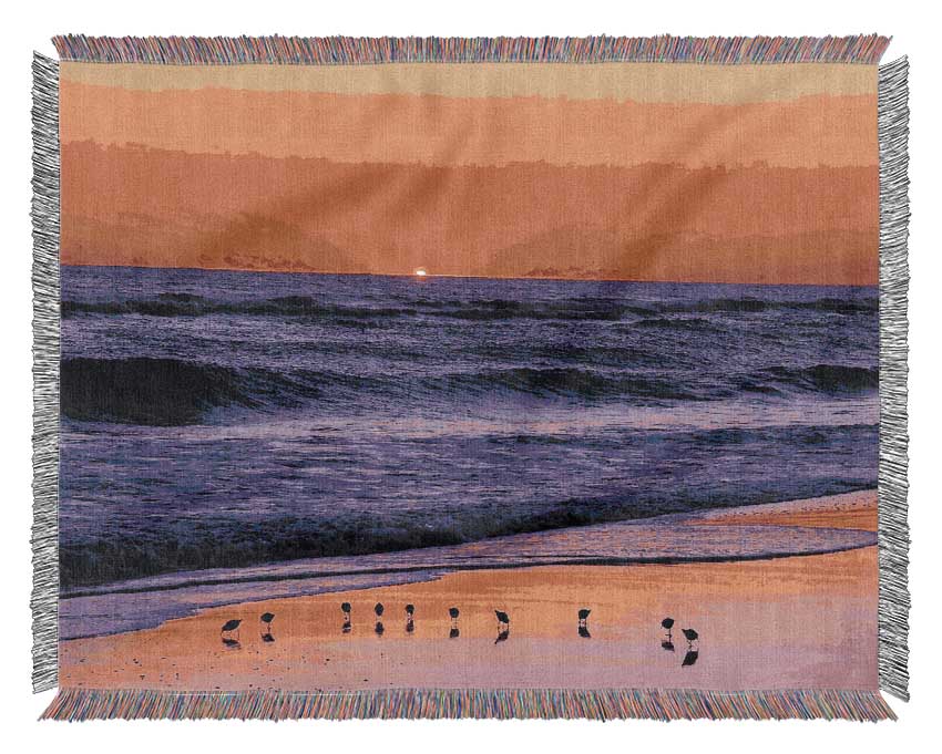 As The Sun Sets Over The Ocean Woven Blanket