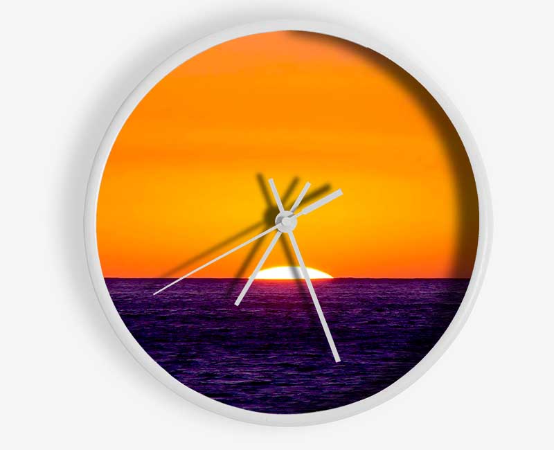 As The Sun Goes Down Over The Ocean Orange Clock - Wallart-Direct UK