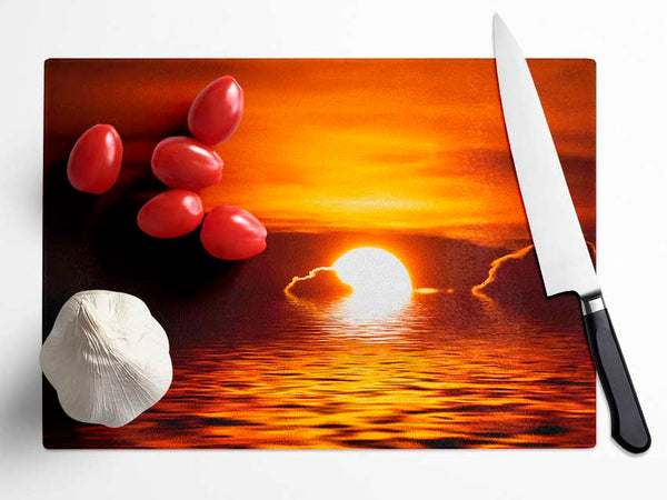 The Sun Falls In The Ocean Glass Chopping Board