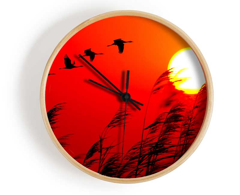 Geese In Flight Under The Red Sun Clock - Wallart-Direct UK