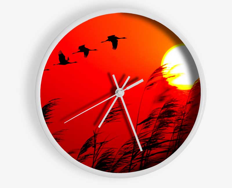 Geese In Flight Under The Red Sun Clock - Wallart-Direct UK