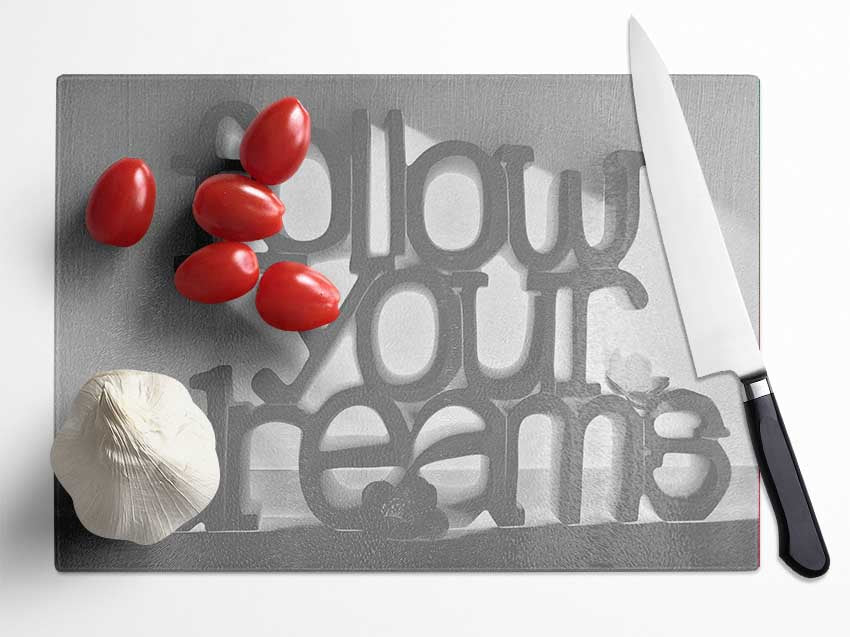 Home Quote Follow Your Dreams Grey Glass Chopping Board