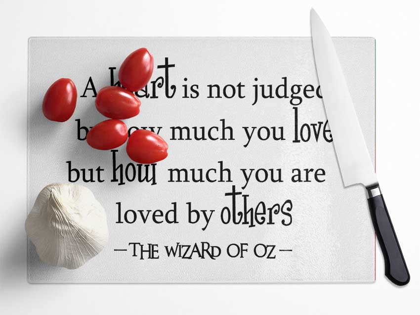 Movie Quote Wizard Of Oz A Heart Is Not Judged Glass Chopping Board