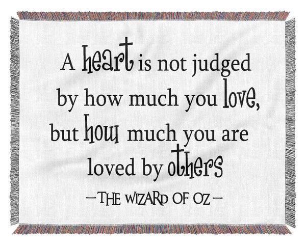 Movie Quote Wizard Of Oz A Heart Is Not Judged Woven Blanket