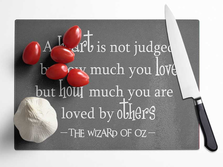 Movie Quote Wizard Of Oz A Heart Is Not Judged Grey Glass Chopping Board