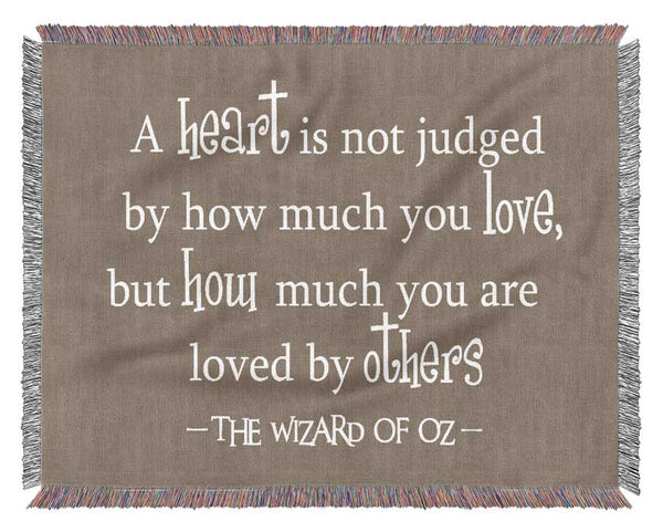 Movie Quote Wizard Of Oz A Heart Is Not Judged Beige Woven Blanket