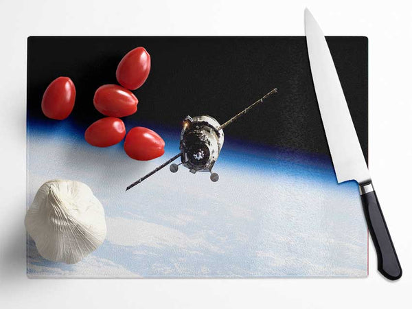 Orbiting The Earth Glass Chopping Board