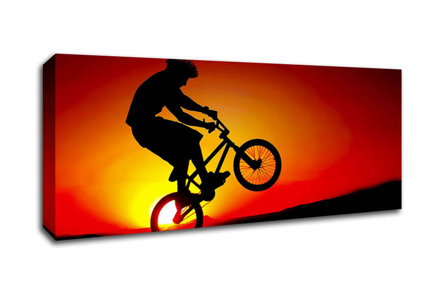 Picture of Bmx Back Wheelie In Red Sunlight Panoramic Canvas Wall Art