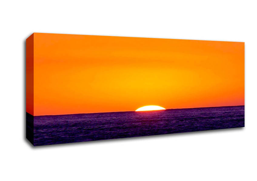 Picture of As The Sun Goes Down Over The Ocean Orange Panoramic Canvas Wall Art