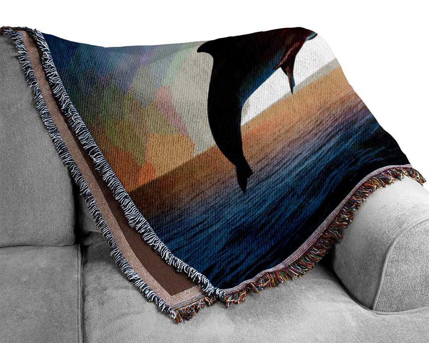 Jumping Sunset Dolphins Woven Blanket