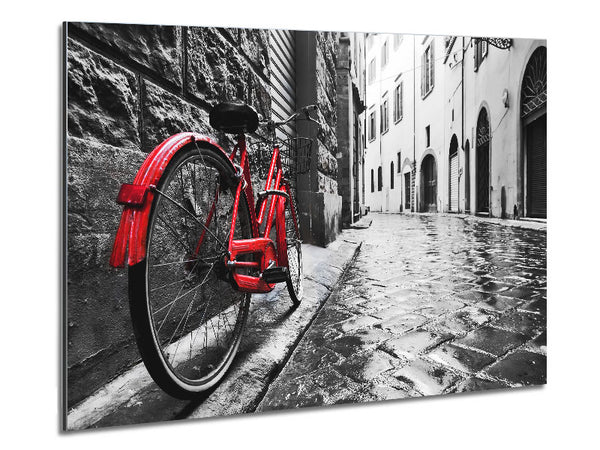 Red Bicycle In The Cobbled Streets