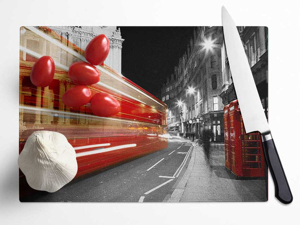 Red Bus Speeding Through The City Glass Chopping Board