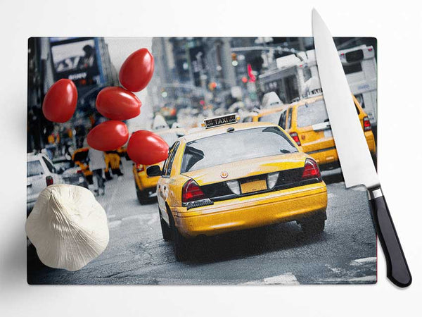 Yellow Taxis On The City Streets Glass Chopping Board