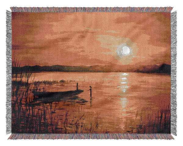 Row Boat On The Sunset Waters Woven Blanket